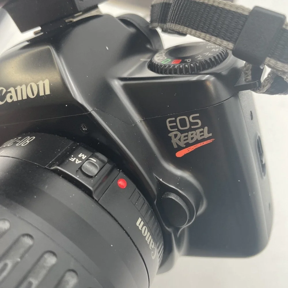 Canon EOS Rebel DSLR Camera +Canon 80-200mm Zoom Lens +Canon 200E Flash+Battery
